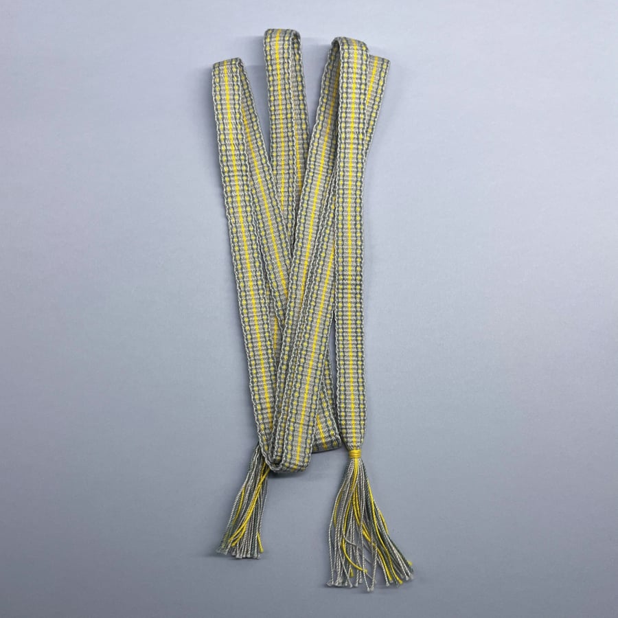 Handwoven band - grey, yellow, blue