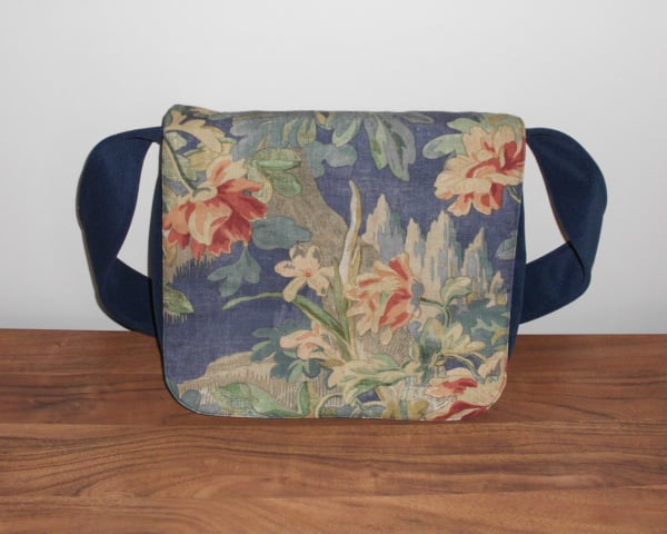 Blue satchel  messenger style bag with floral flap front