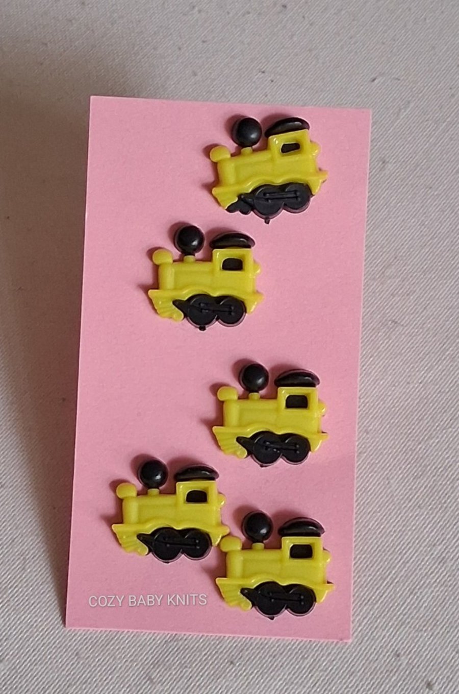 5 YELLOW PLASTIC TRAIN BUTTONS 