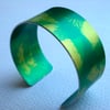 Green and gold cuff