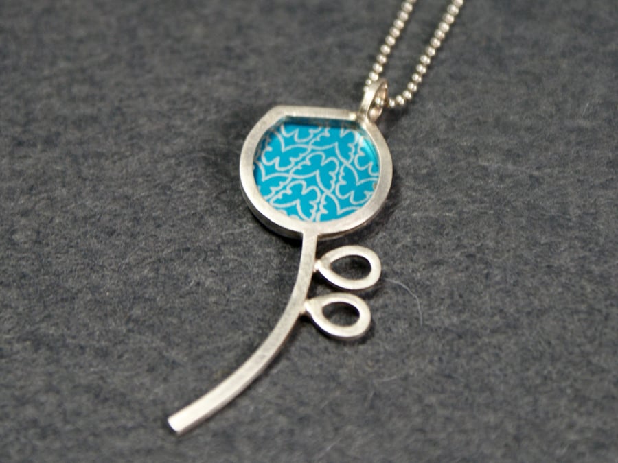 Silver and blue pod pendant