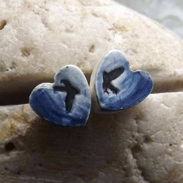 Handmade ceramic and sterling silver Swallows Heart stud earrings in blue