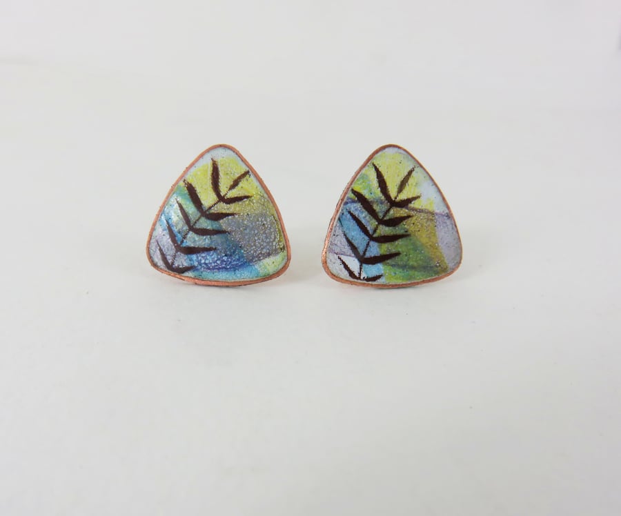 Triangle copper studs with colourful enamel washes and leaf detail.