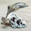 Dolphin on small waves