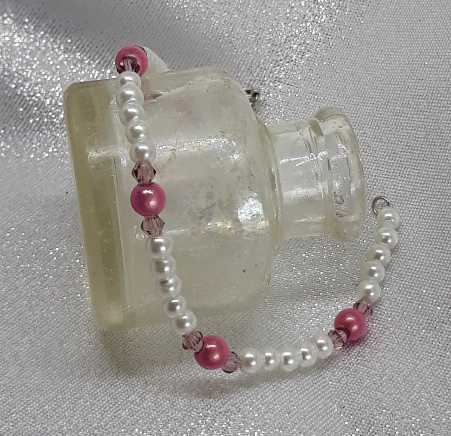 BR210  Pink and white beaded bracelet