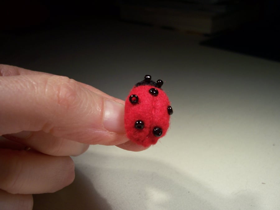 Tiny hand stitched felt ladybird brooch, made to order