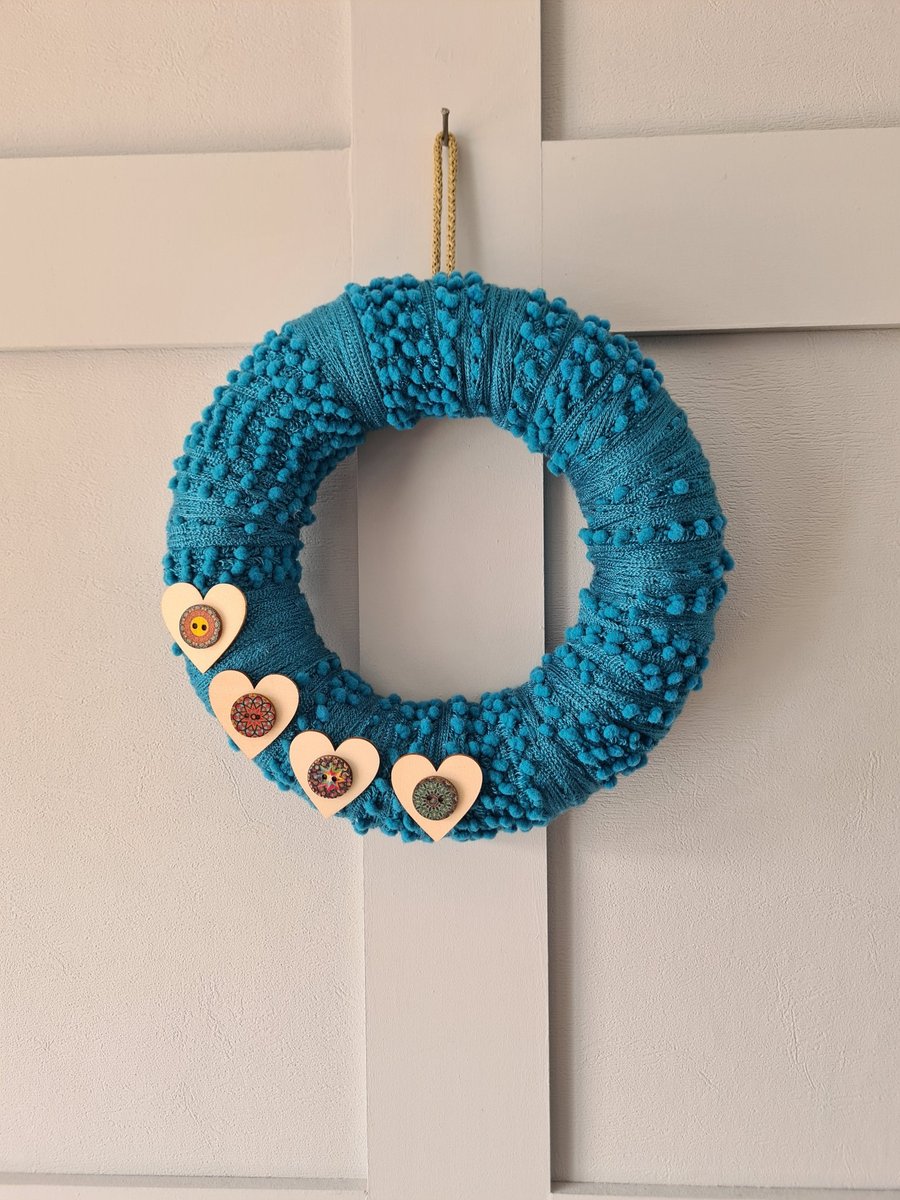 Bobbly blue yarn wrapped wreath 