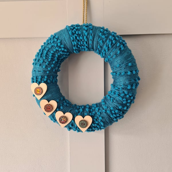 Bobbly blue yarn wrapped wreath 