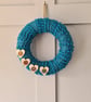 Bobbly blue yarn wrapped wreath 