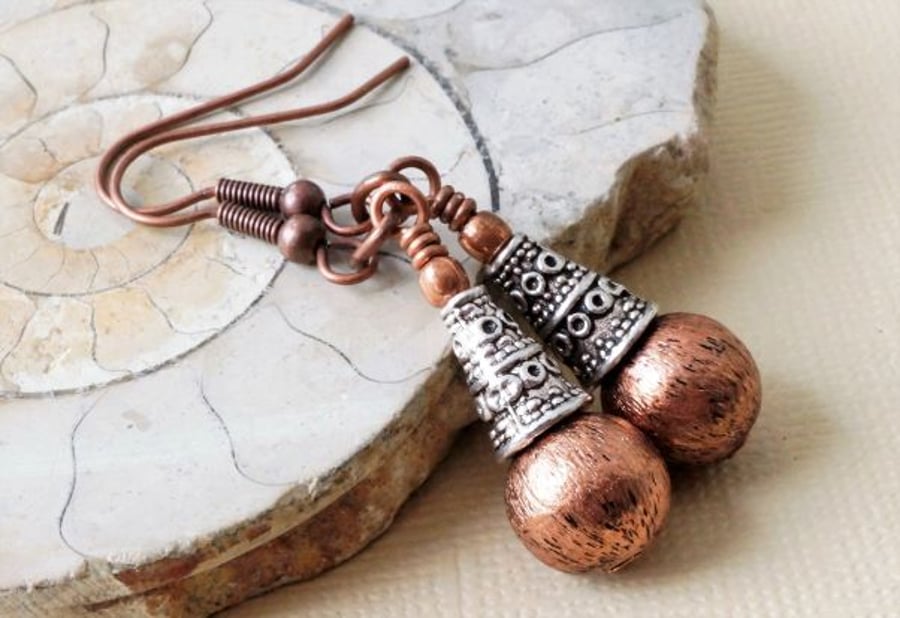 Brushed copper and Tibetan silver ethnic style earrings.