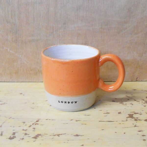 Mug Bright Orange new London logo Ceramic.