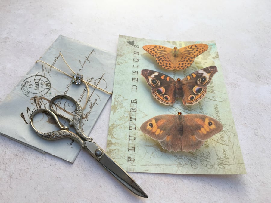 Trio of beautiful brown silk butterfly hair clips with Swarovski Crystals.