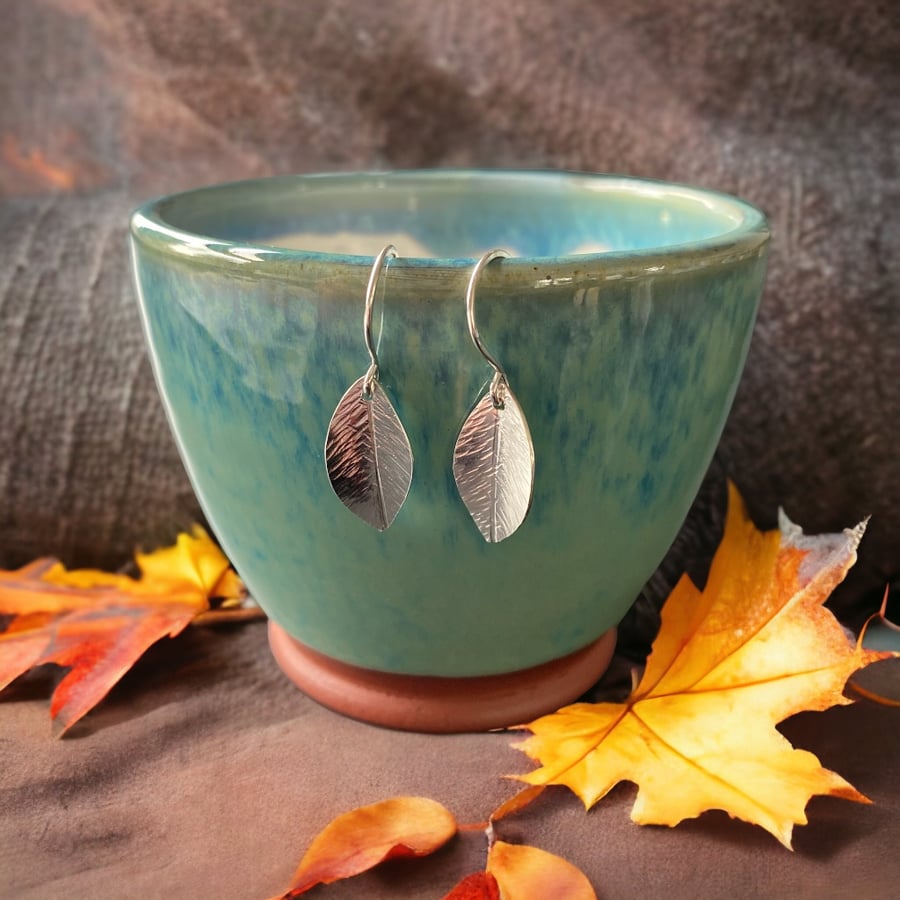 Textured leaf earrings.