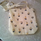 Minions on pale yellow Fabric Shoulder Bag