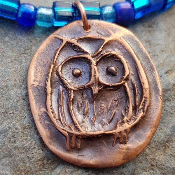 Copper owl necklace with blue glass 