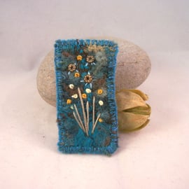 Needle felted and hand embroidered brooch 