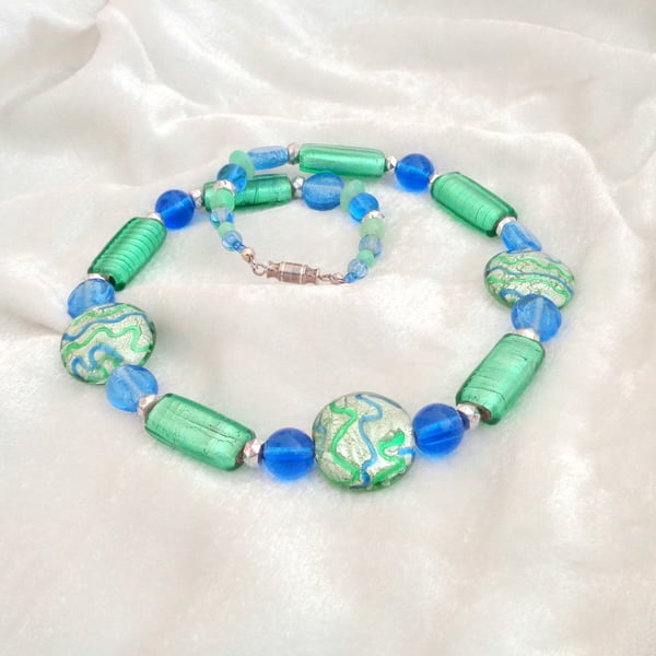 Glass bead necklace in shades of blue, silver & green