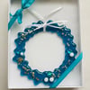 Teal fused glass wreath decoration