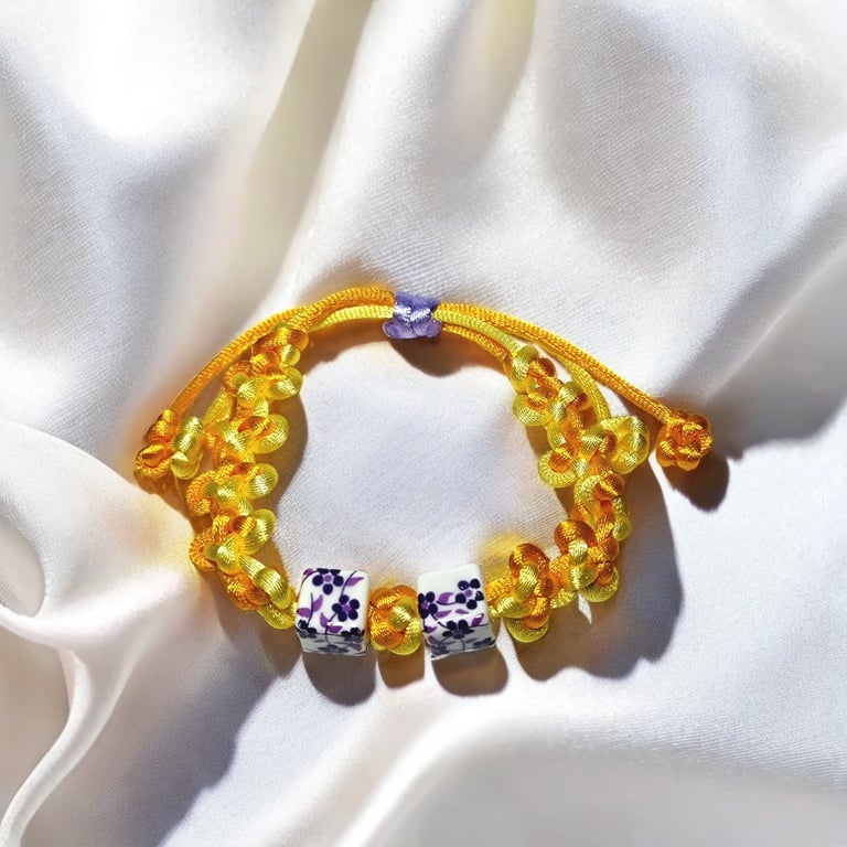 Handmade Macrame Cloverleaf Knot Bracelet with Floral Clay Beads