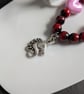 Pink and red heart beaded bracelet with unicorn  - Image 2