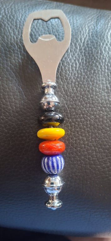 Glass beaded bottle open
