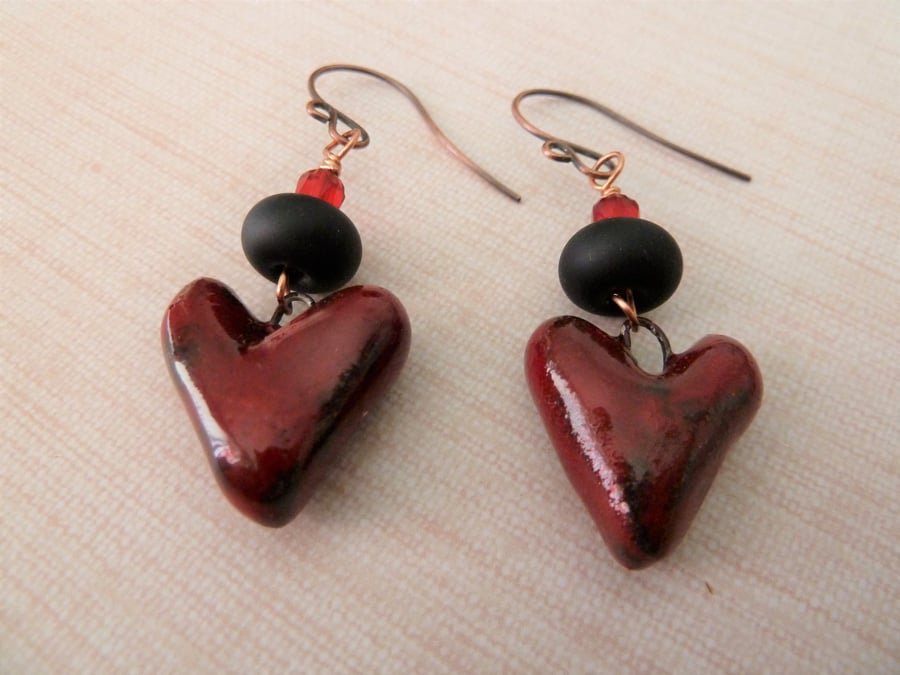red and black ceramic heart earrings, copper and lampwork