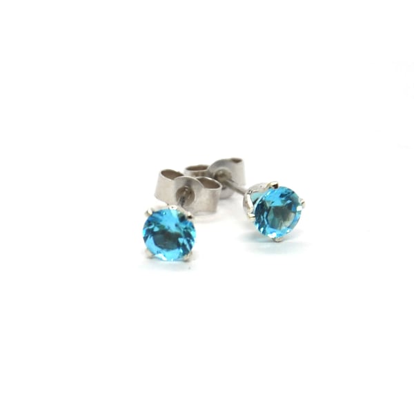 Silver Swiss blue topaz stud earrings - claw set