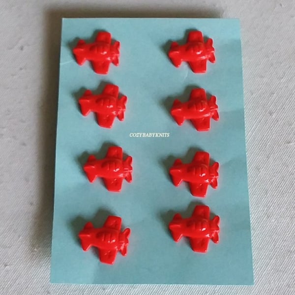 Red plane buttons