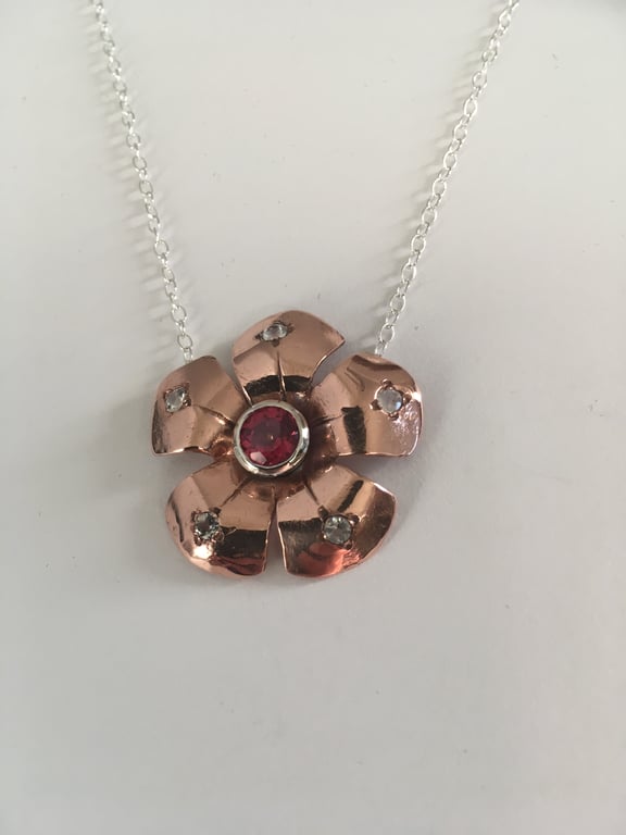 Topaz blossom pendant 
