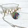 Multi coloured necklace, 25mm geometric mosaic disc pendant. P25-245