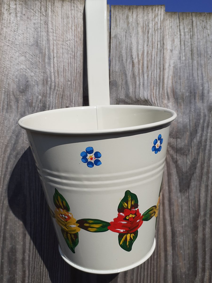 Round hanging planter handpainted with canal art style roses and daisies