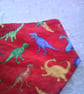 Brightly Coloured Dinosaurs on Red Dribble Bib - Image 5