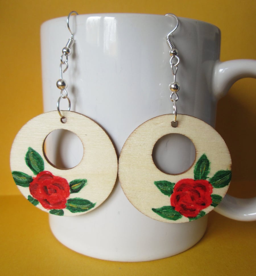Rose handpainted wooden earrings.