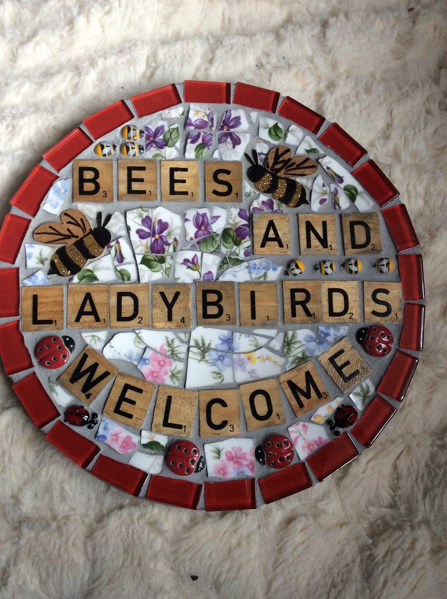 Bees and ladybirds welcome sign