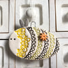 Ceramic bee decoration squiggle design