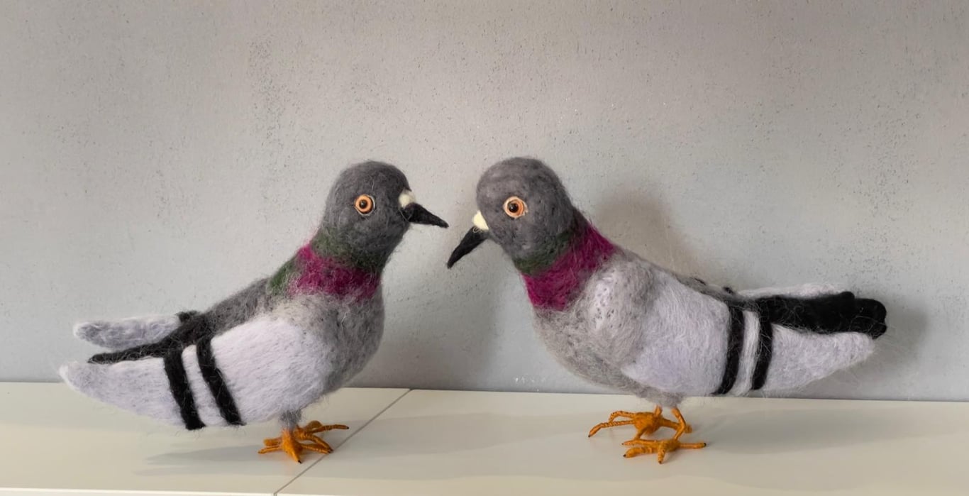 A pair of wool felted pigeons
