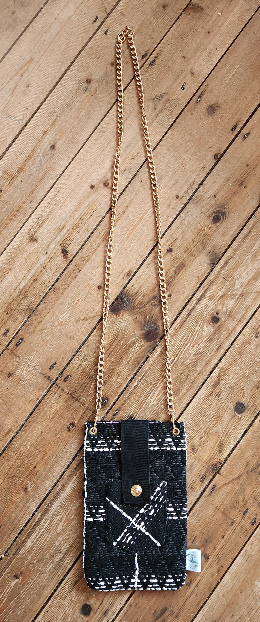 BLACK AND IVORY BOUCLE MOBILE CARRIER WITH CHAIN STRAP