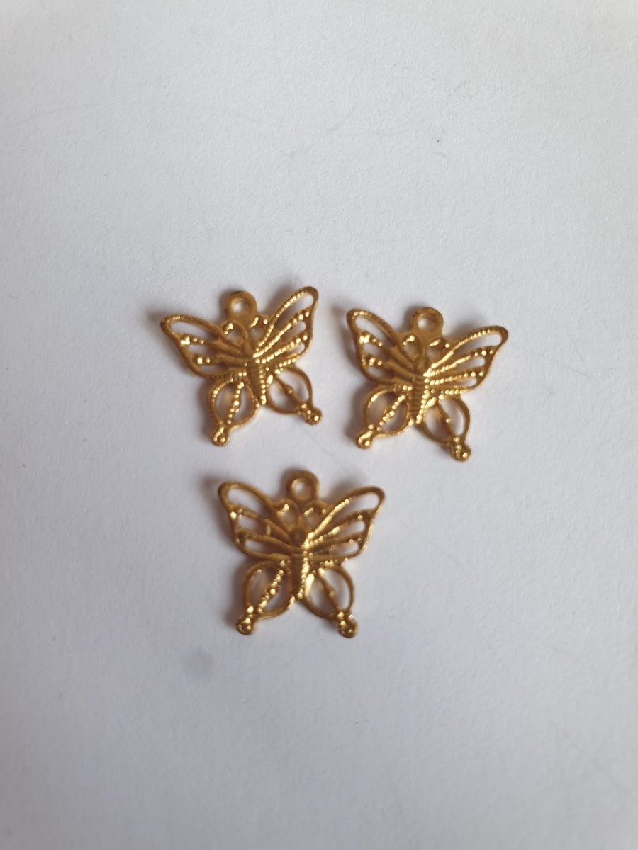 3 butterfly charms 