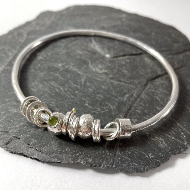 Silver peridot and gold bangle  No Worries Bangle fidget kinetic charm