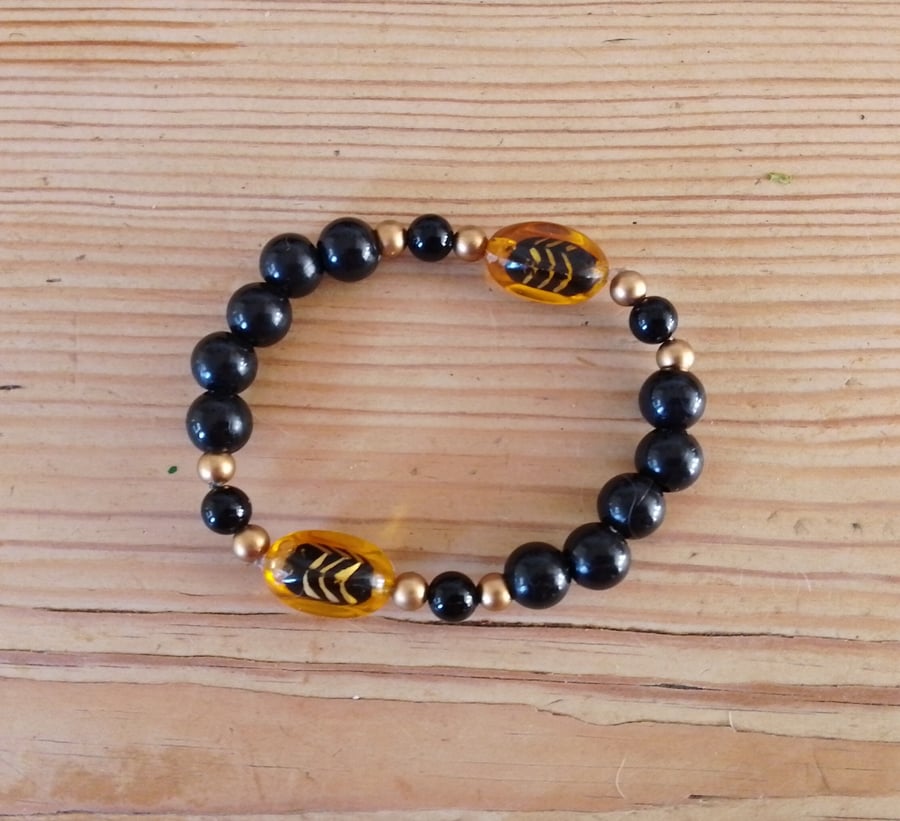 Handmade bracelet made using pre-loved beads.