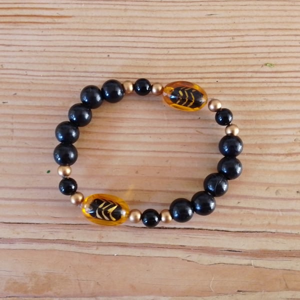 Handmade bracelet made using pre-loved beads.