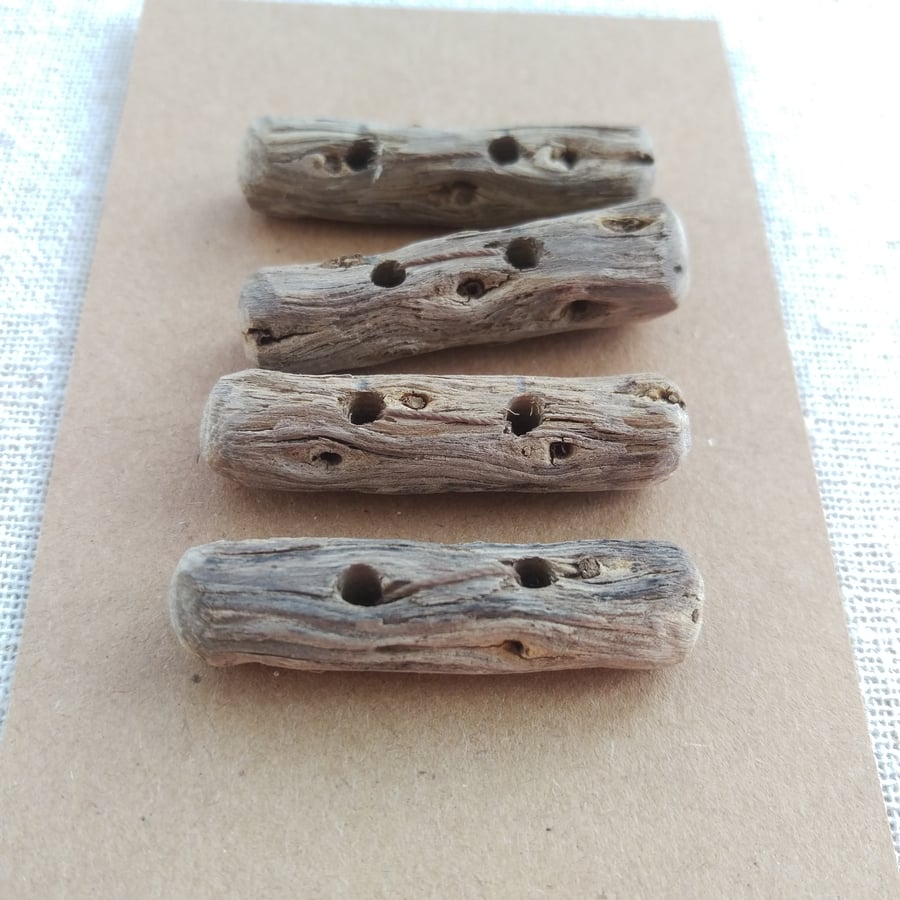 Four driftwood toggle buttons