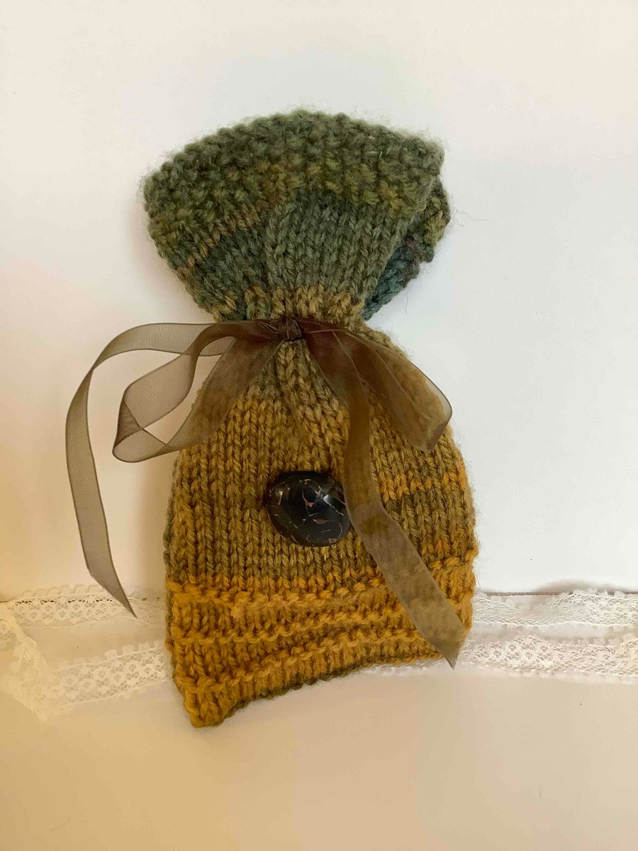 knitted gift bag with antique brown leather button