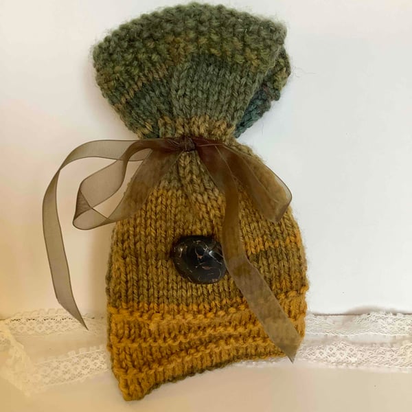 knitted gift bag with antique brown leather button