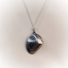 Sterling silver seashell with silver pearl