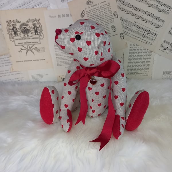 Esme, heart print teddy bear