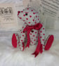 Esme, heart print teddy bear