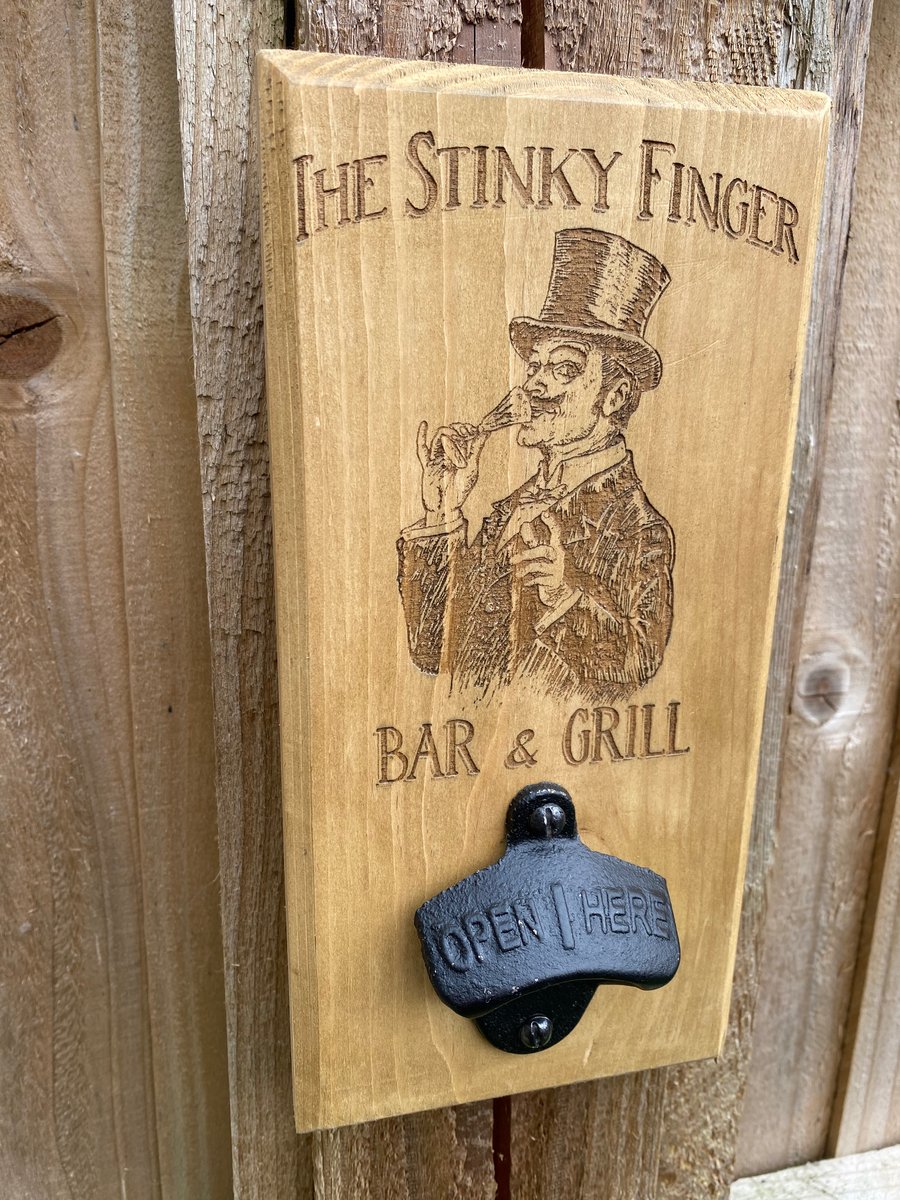 Wall mounted bottle opener 