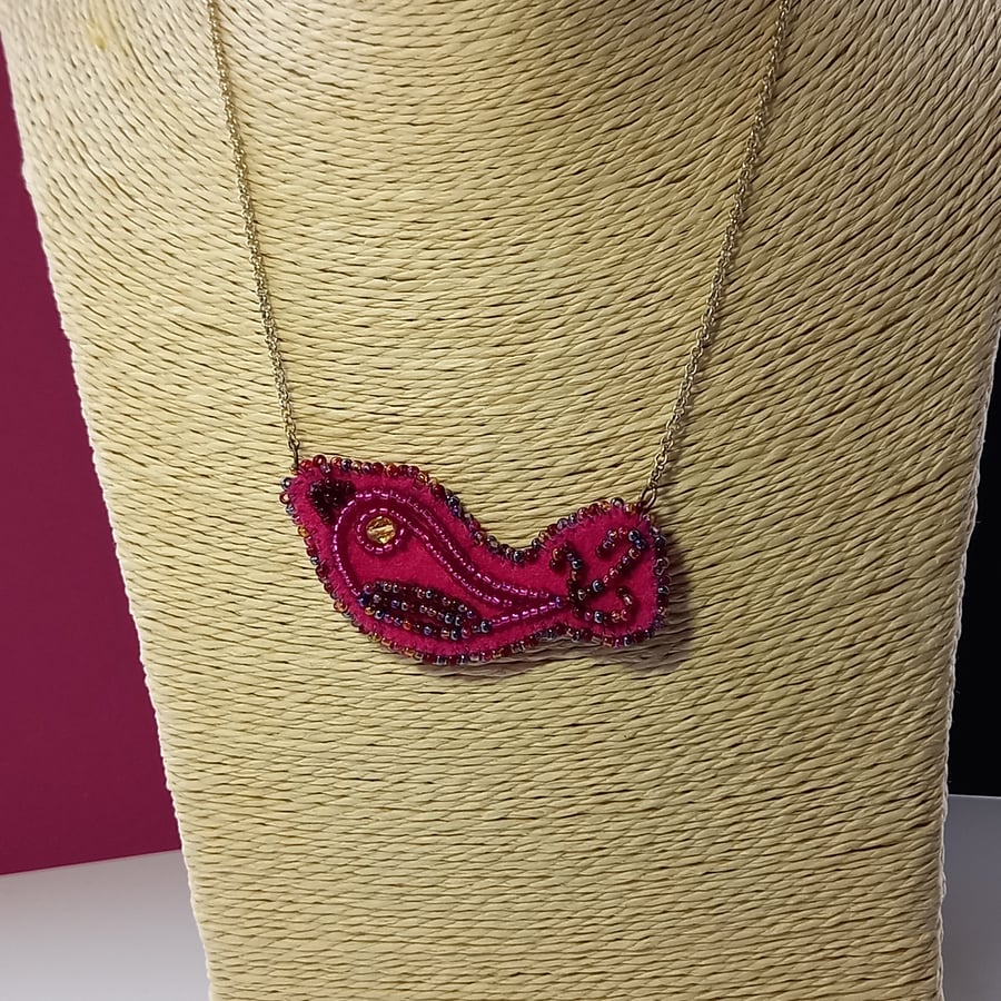 Pink bird pendant