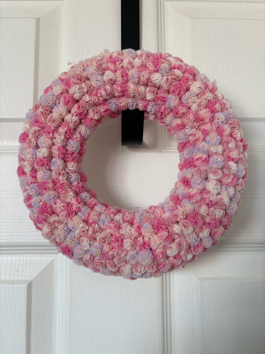Pinks baby shower wreath. 